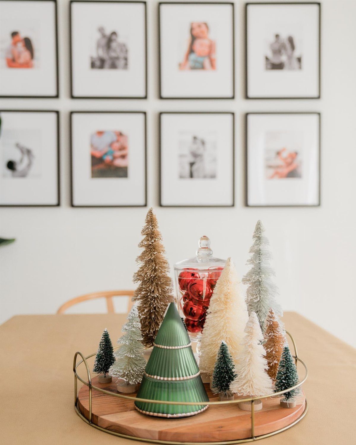 Christmas Table Centerpieces: 8 Ideas for Holiday Tables 5 Bottle brush trees in various colors and sizes arranged on a wooden tray.
