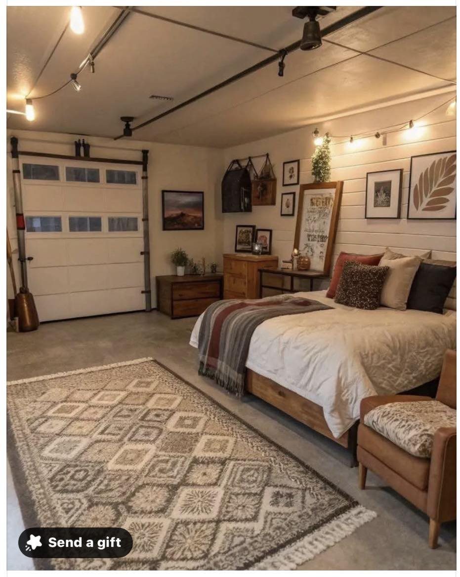 Garage into Bedroom: 4 Ideas From Guesthouse to Home Theater 3 A cozy bedroom setup featuring a large bed and a white garage door in the background.